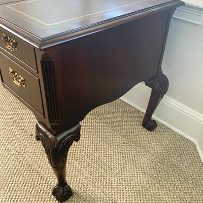Leather top traditional desk with finished back measures 58" x 29"