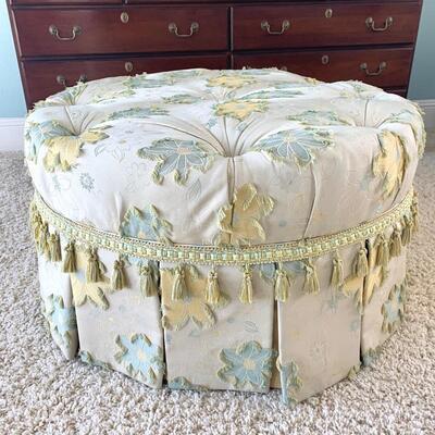 Floral tufted ottoman on casters measures 37