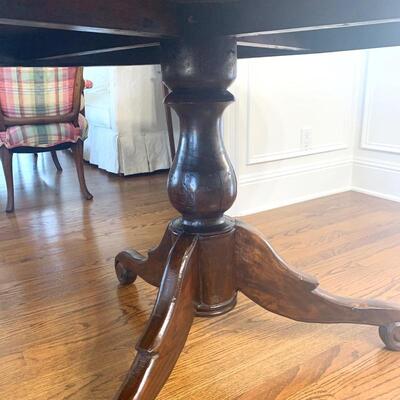 Round pedestal table measures 46" in diameter and 30" high