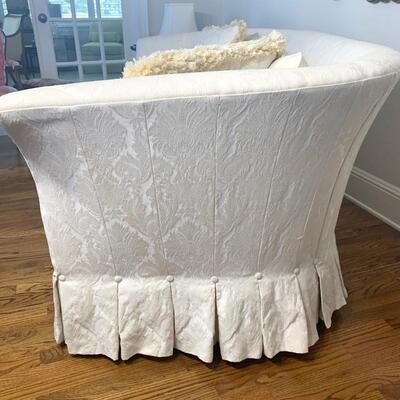 White damask sofa/loveseat measures 75" long and 37" deep