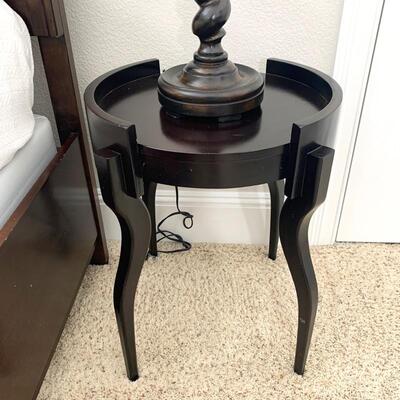 Contemporary round side table measures 18