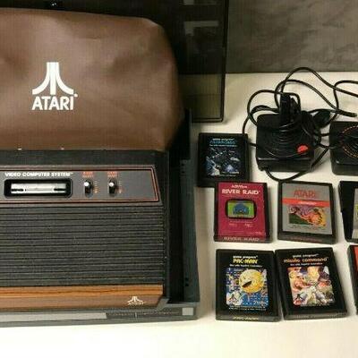 https://www.ebay.com/itm/124658530865	BM0100 ATARI GAME SYSTEM WITH 2 JOYSTICKS, CASE, COVER AND 10 GAMES UNTESTED 

