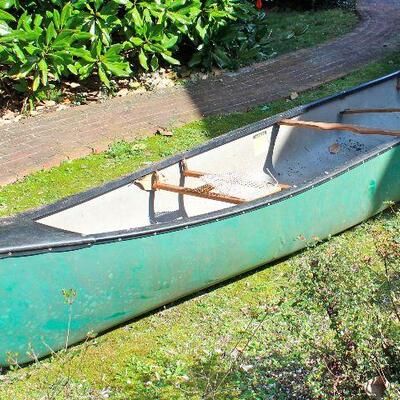 "Legend" canoe by Dagger - comes with 2 paddles, 2 flotation vests, 2 flotation cushions, and an anchor.