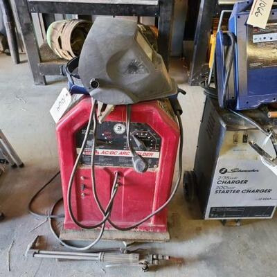 1064	

Lincoln Electric AC/DC Arc Welder, Welding Mask, And Torch End
Lincoln Electric AC/DC Arc Welder, Welding Mask, And Torch End