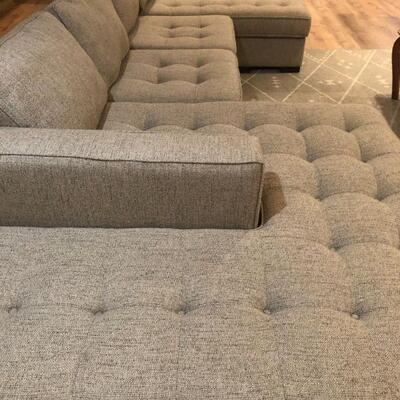Massive family sofa. Over 170 inches wide you can fit everyone...even the dogs! Perfect spot for family time. Great oatmeal/grey color...