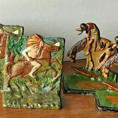 https://www.ebay.com/itm/124680463930	CC0048 2 PAIRS OF CAST IRON BOOK ENDS NATIVE AMERICAN THEMED	Auction
