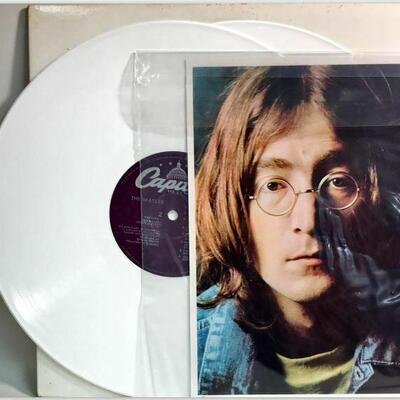 https://www.ebay.com/itm/124680457471	BM0127C THE BEATLES "`WHITE ALBUM" SEBX-11841 WHITE VINYL SET OF 2 LP W 4 PRINTS	Auction
