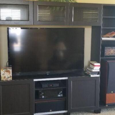 entertainment center holds all of your needs, sold separately
