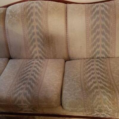 living room sofa with wood trim