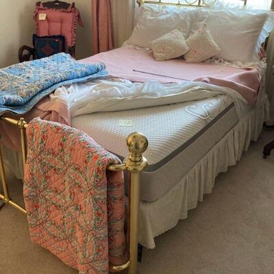 Double brass bed