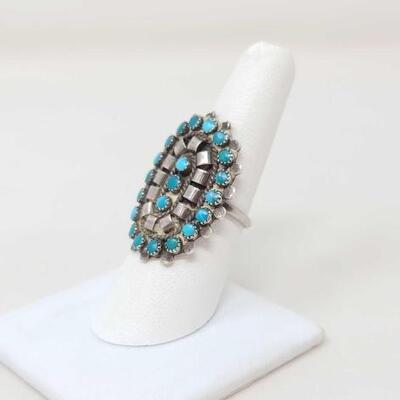 1220	

Native American Turquoise Cluster Sterling Silver Ring, 5.6g
Weighs Approx. 5.6g Measures Approx. 1.5" Size 7.5