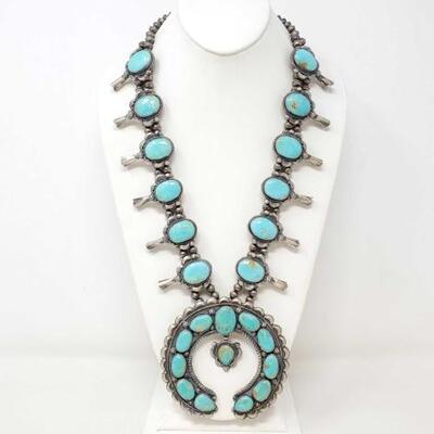 1130	

Native American Betta Lee Handmade Sterling Silver Squash Blossom With Kingman Turquoise Stones
Weighs Approx 247.3g Pendant...