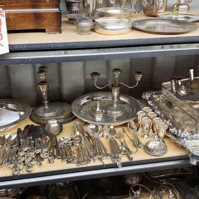7538	

Weighted And Plated Silver Platters, Utensils, Candle Stick Holders, And More
Brands Include Empire, Rogers Bros, Sheffield...