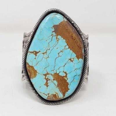 1140	

Native American Chimney Butte Sterling Silver Cuff With Large Turquoise Stone, 188.9g
Marked "Chimney Buute" And...