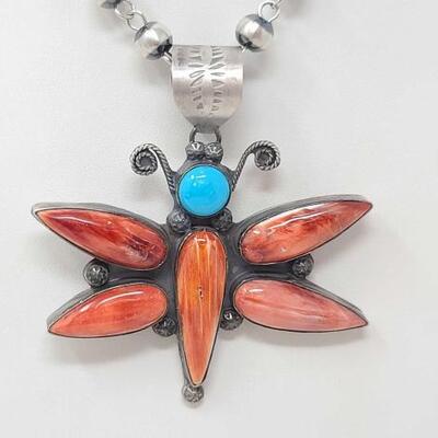 1236	

Native American ZIA Orange Spiny Oyster and Turquoise Sterling Silver Dragonfly Pendent, 56.9g
Weighs Approx. 56.9g Measures...