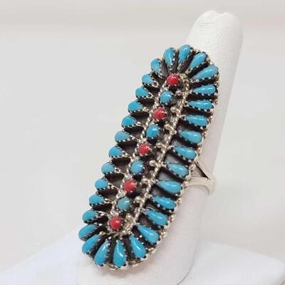 1214	

Native American Turquoise and Coral Cluster Sterling Silver Ring, 11.5
Weighs Approx. 11.5g Measures Approx. 1.7" Size 8 S.S...
