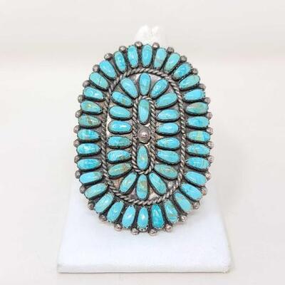 1274	

Native American P&V by Joe Turquoise Cluster Sterling Silver Ring, 23.9g
Weighs Approx. 23.9g Measures Approx....