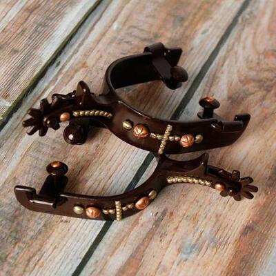 60	

NEW copper studded cross and engraved copper with gold studs Spurs
brown steel spur with copper studed cross and engraved copper and...