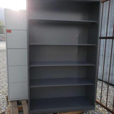 15022	

Metal Bookshelf and metal filing cabinet
Metal Bookshelf and metal filing cabinet measure 42x15x68 and 42x18x65