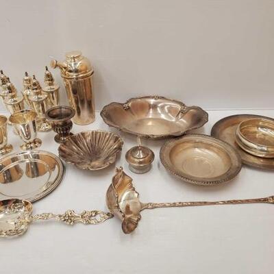 7535	

Sterling Silver Salt and Pepper Shakers, Trays, Laddle, Cups and More, 1943.6g
All combined weighs approx 1943.6g