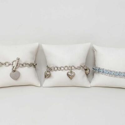 1285	

3 Sterling Silver Bracelets- 57.8g
Weighs Approx 57.8g