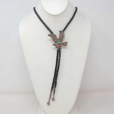 1254	

Native American Turquoise and Coral Sterling Silver Eagle Bolo Tie, 25g
Weighs Approx. 25g Measures Approx. 37 " STAMPED...