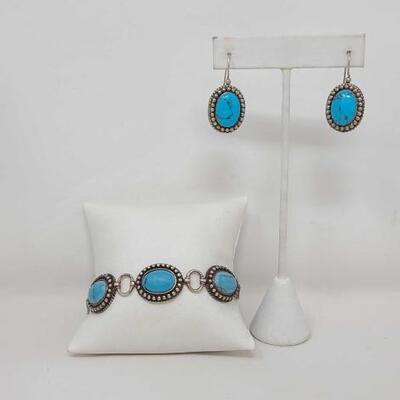1250	

Native American Turquoise Sterling Silver Link Bracelet with Matching Earrings, 30.4g
Weighs Approx. 30.4 Measures Approx....