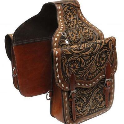 21	

Tooled leather saddle bag.
Tooled leather saddle bag. This saddle bag features floral tooled leather and comes equipped with front D...