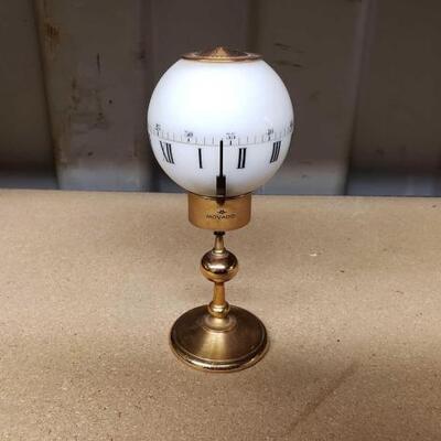 7550	

Movado Spherical Clock
Measures Approx: 3" x 7"