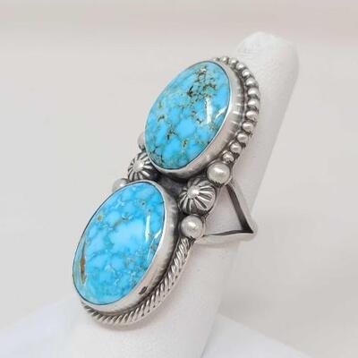 1228	

Native American Kathleen CL Turquoise Sterling Silver Ring, 20.4g
Weighs Approx. 20.4g Measures Approx. 2" Size 7 ARTIST...