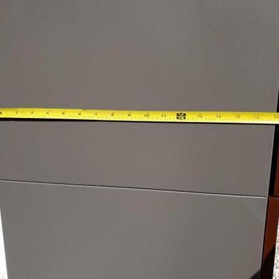 15010	

Three Metal file cabinet
Cabinets measure approx between 18x15-36x18