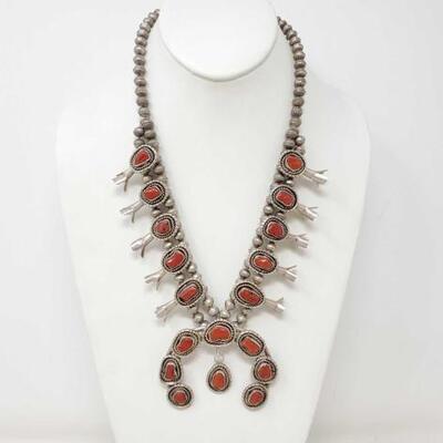 1164	

Native American Sterling Silver Squash Blossom With Coral Stones, 112.3
Weighs Approx 112.3g Pendant Measures Approx 3"...