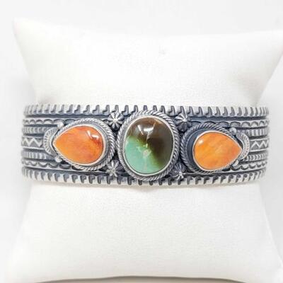 1136	

Native American June Defauto Sterling Silver Cuff With Spiny Oyster And Turquoise Stones, 96.7g
Stamped "June Defauto"...