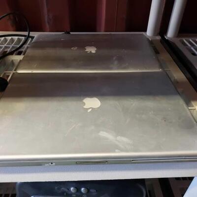 6018	

2 Apple Laptops
15"x10"
