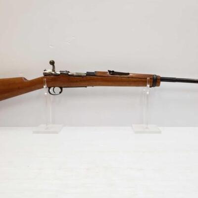 668	

Mauser 8mm Bolt-Action Rifle
Serial Number: 1733 Barrel Length: 22 inches