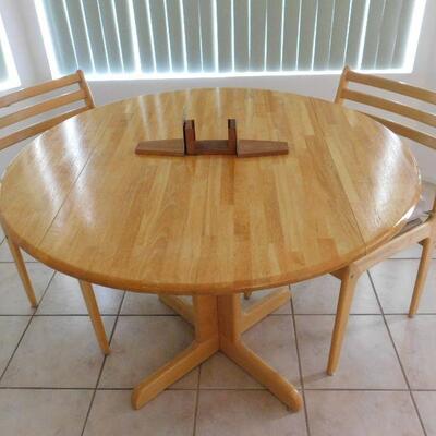 Kitchen table with fold down sides and two chairs