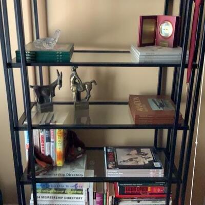 4 Tier Wrought Iron Glass Bookcase

4 Tier storage space single piece of bookcase with clear glass shelves.