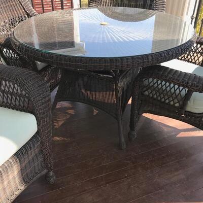 faux wicker table and 4 chairs $350