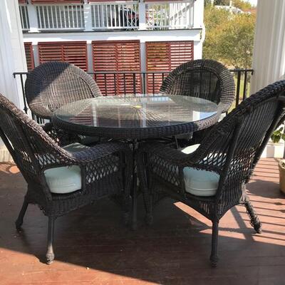 faux wicker table and 4 chairs $350 as is
table 48 X 30