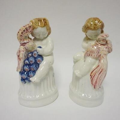 1017	PAIR OF PORCELAIN FIGURES OF CHILDREN, IMPRESSED NUMBER ON THE BASE, 11 IN HIGH
