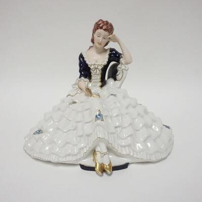 1001	ROYAL DUX PORCELAIN LADY READING, 10 IN HIGH X 13 IN WIDE
