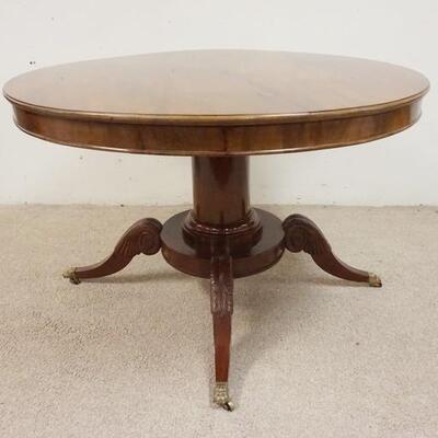 1026	ROUND PEDESTAL TABLE-BRASS CLAW FEET, CARVED LEGS, 46 IN DIAMETER, 30 IN HIGH

