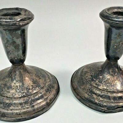 https://www.ebay.com/itm/124707806953	CC0057 PAIR OF WEIGHTED STERLING SILVER CANDLE STICK HOLDERS	10 Day Auction
