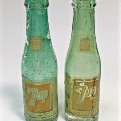 https://www.ebay.com/itm/124707818583	DS0007 PAIR OF VINTAGE MINI 7UP BOTTLES W CAPS FOR S&P SHAKER STAMP BUFFALO NY	10 Day Auction
