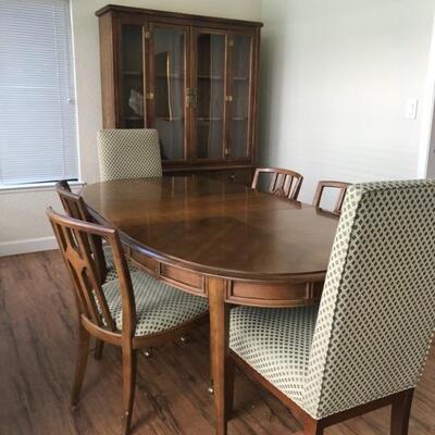 Timeless beauty dining set with 6 chairs, two with upholstered backs.   Table is 62" long in smallest setting x 42" wide x...
