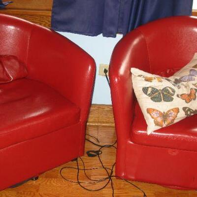 Primo International red leather swivel chairs.  