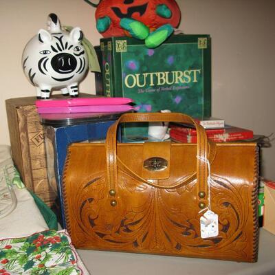 vintage leather tooled purse, games and zebra piggy bank