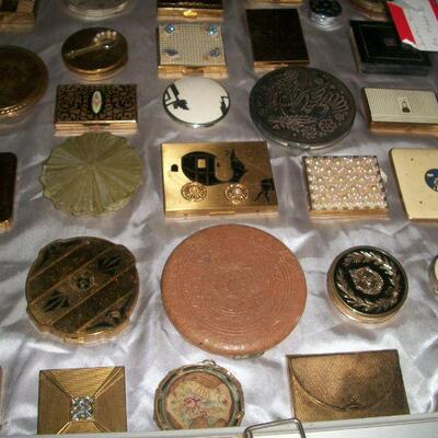 Large collection of vintage compacts.