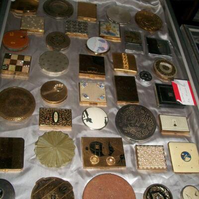 Large collection of vintage compacts.