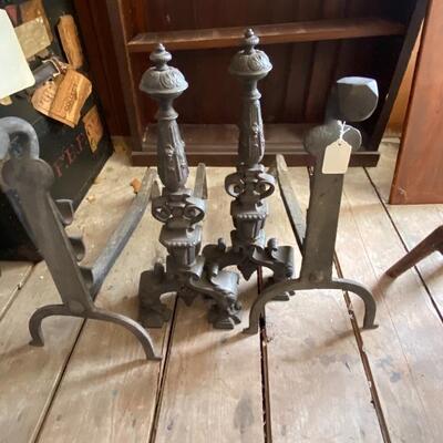 a few of the andirons and fireplace equipment